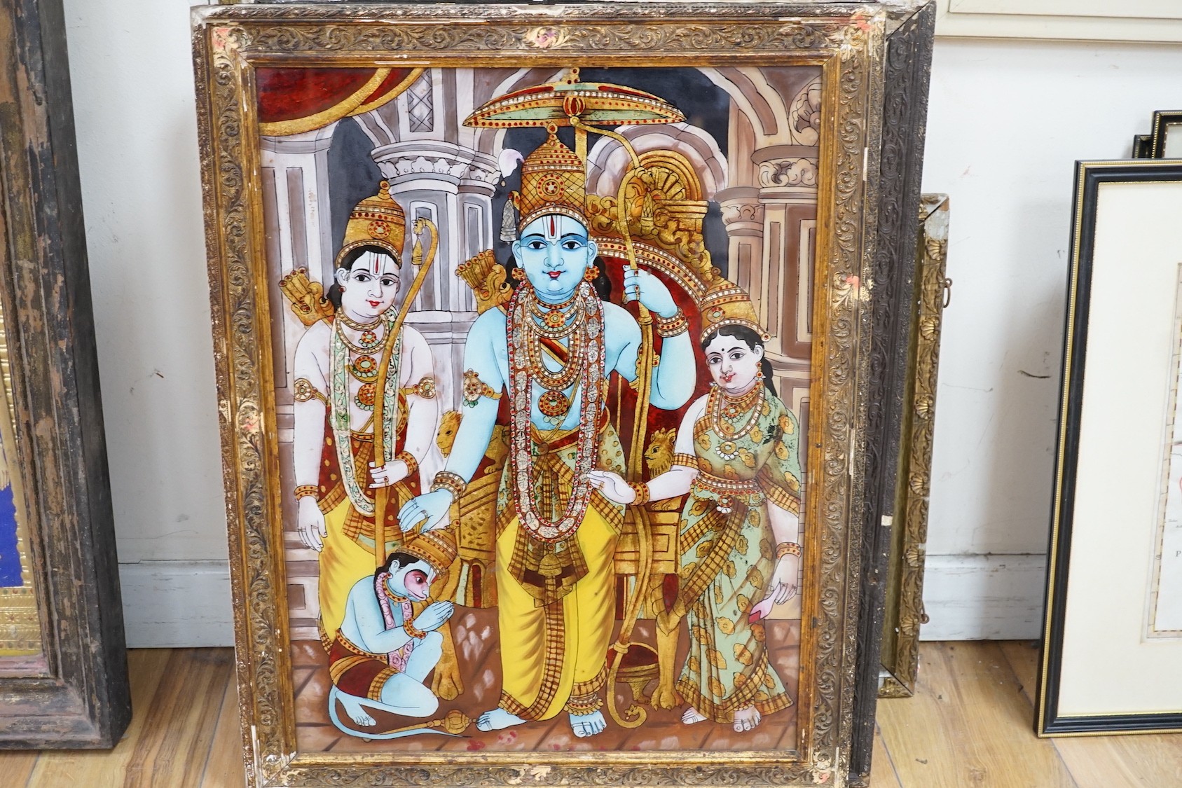 Indian School, eight assorted reverse paintings on glass, Studies of nobles, deities and other figures, largest 60 x 44cm